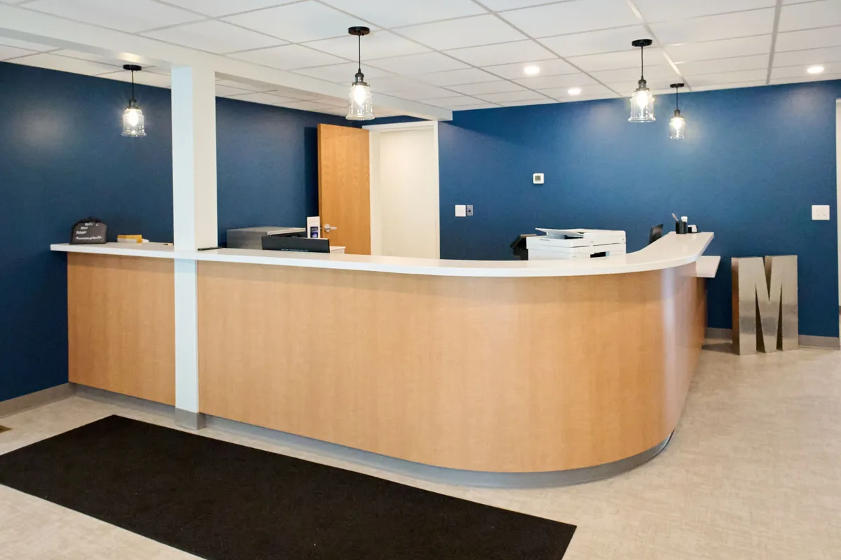 Mecca Dental front desk and reception area in Utica, NY